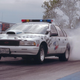 Image for article titled Drag Race A Cop In "Beat The Heat" Challenge